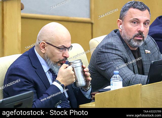 RUSSIA, MOSCOW - NOVEMBER 29, 2023: Nikolai Nikolayev (L), chairman of the Russian State Duma's Natural Resources, Property and Land Committee