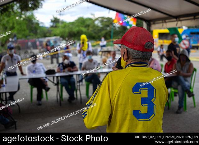 A men wearing a national football team shirt of Colombia speaks as Mayor of Yumbo, Valle del Cauca, John Jairo Santamaria gathers in a meeting with OAS...