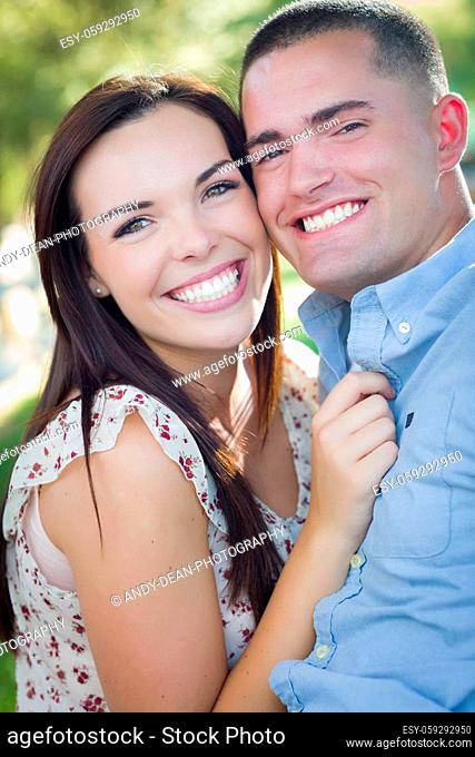 Happy Mixed Race Romantic Couple Portrait in the Park