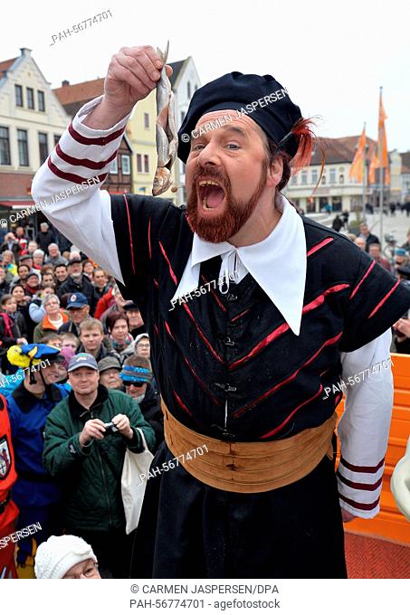 Bernd Maas, dressed as mediaeval pirate Klaus Stoertebeker, delivers a speech in front of the town hall of Verden, Germany, 16 March 2015