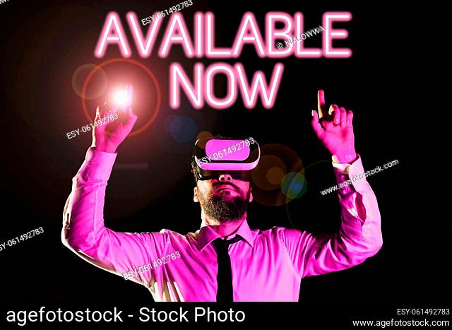Inspiration showing sign Available Now, Word for Handy Eligible Today Present Bachelor Here on Board Accessible Businessman Using Virtual Reality Simulator And...
