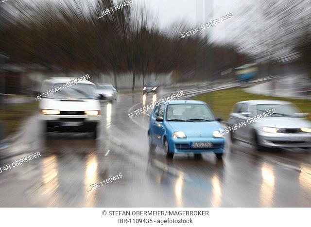 Cars in rain, Munich, Bavaria, Germany