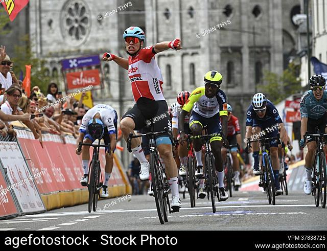 Belgian Arnaud De Lie of Lotto Soudal crosses the finish line to win and during the third stage of the Tour De Wallonie cycling race