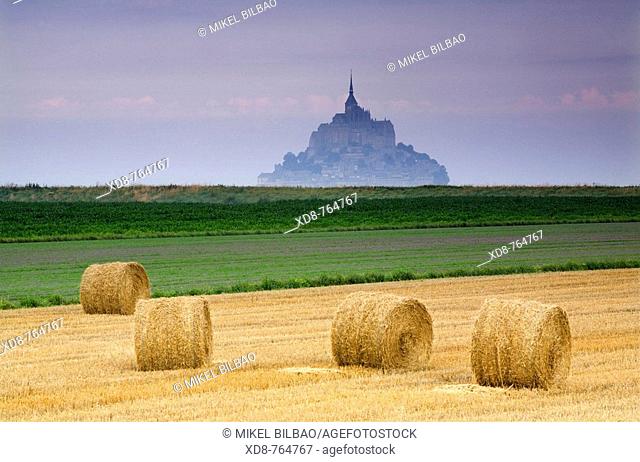 St Michael's Mount and farm land with wheat bales, Manche Department, Basse-Normandie region, Normandy, France, Europe