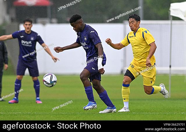 Anderlecht's Noah Sadiki and STVV's Shinji Kagawa pictured in action during a friendly match between Belgian first division soccer teams RSCA Anderlecht and...