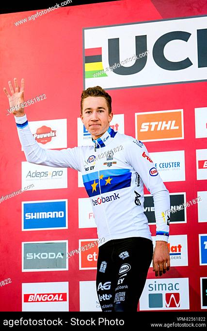 Belgian Jente Michels celebrates on the podium after the U23 race at the World Cup cyclocross cycling event in Namur, Belgium