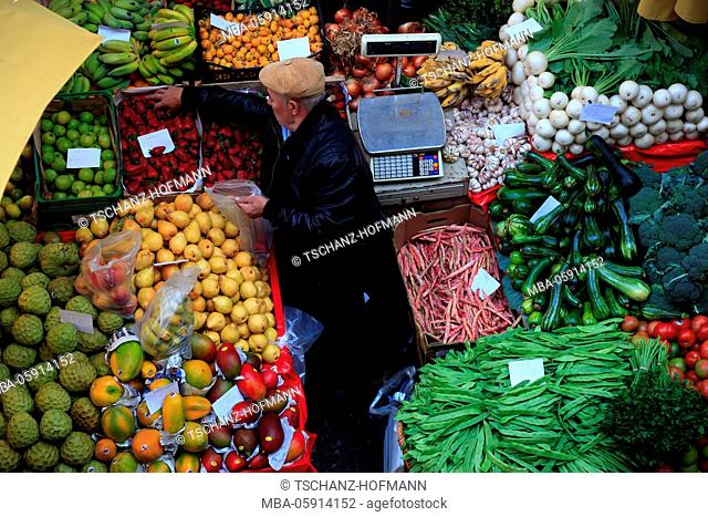 Island Madeira, Funchal, at the covered market Mercado dos Lavradores, fruit and vegetables, merchant