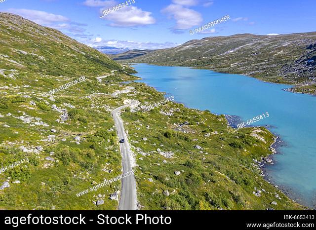 Aerial view, Turquoise lake and mountains, Road, Norwegian Landscape Route, Gamle Strynefjellsvegen, between Grotli and Videsæter, Norway, Europe