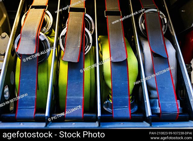 03 May 2021, Baden-Wuerttemberg, Staufen im Breisgau: Hoses are loaded in the equipment compartment of a fire engine. Photo: Philipp von Ditfurth/dpa