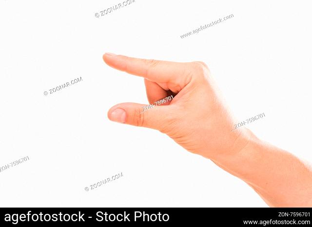 Close-up of caucasian man#39;s hand holding stock of blank papers isolated on white background. The photo represented by point and thumb fingers