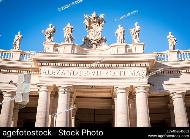VATICAN, ROME, ITALY - NOVEMBER 17, 2017: Columns and plaque on the right side of Vatican Square in Rome