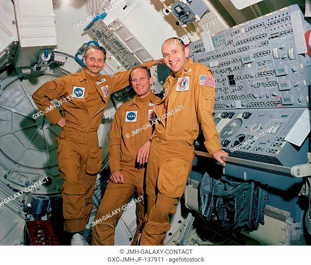 These three men are the prime crewmen for the Skylab 3 mission. Pictured in the one-G trainer Multiple Docking Adapter (MDA) at the Johnson Space Center (JSC)...