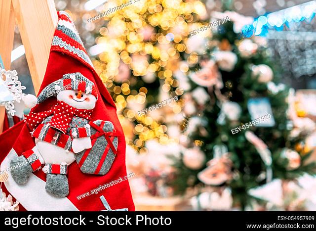 A christmas red socks for gift with a snowman, Christmas concert