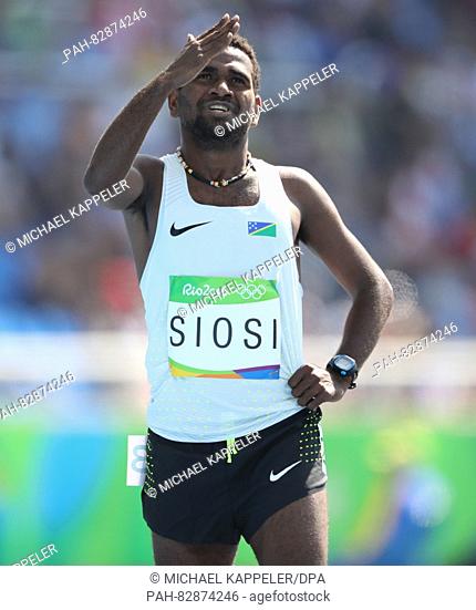 Rosefelo Siosi of Solomon Islands competes in Men's 5000m Round 1 heat of the Athletic, Track and Field events during the Rio 2016 Olympic Games at Olympic...