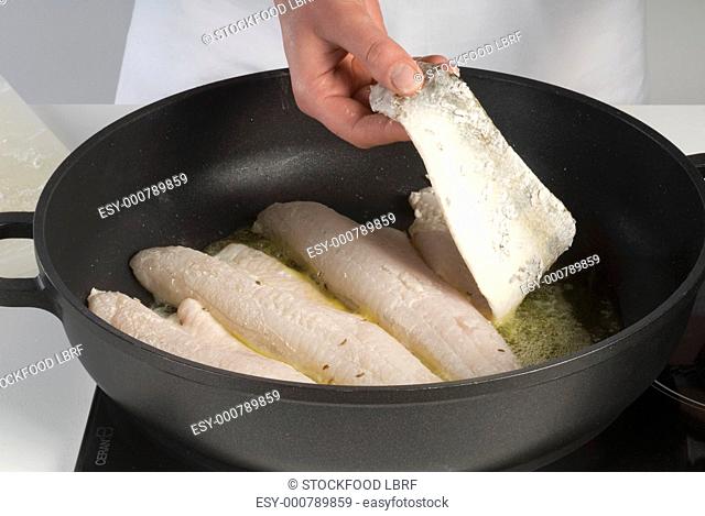 Frying zander fillets in a frying pan