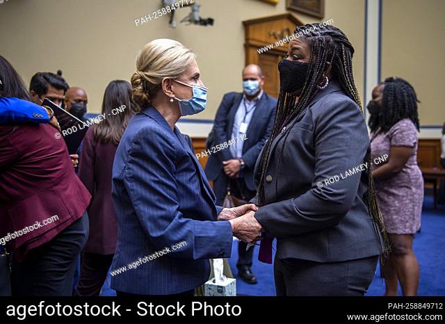 United States Representative Cori Bush (Democrat of Missouri), right, is comforted by United States Representative Carolyn Maloney (Democrat of New York)