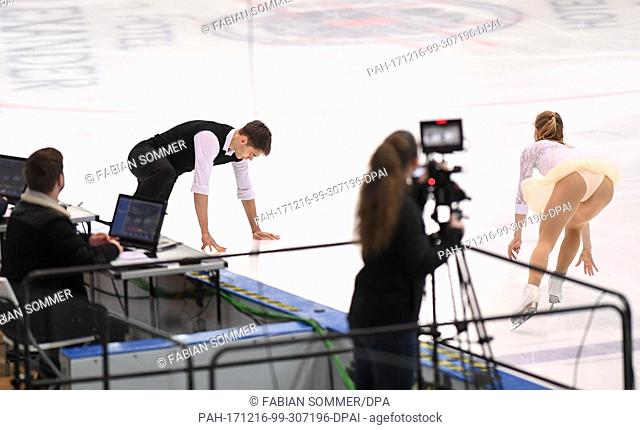 Minerva-Fabienne Hase and Nolan Seegert get up after a fall during the Pair's event of the German Figure Skating Championships taking place in the Eissporthalle...