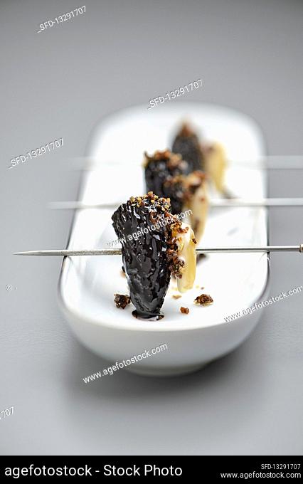 Black morels with almonds and 'liquorice sugar' made from olives