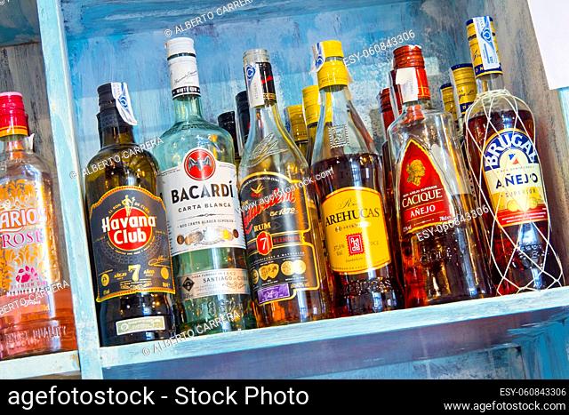 Coloured Ron Liqueur Bottles at Bar