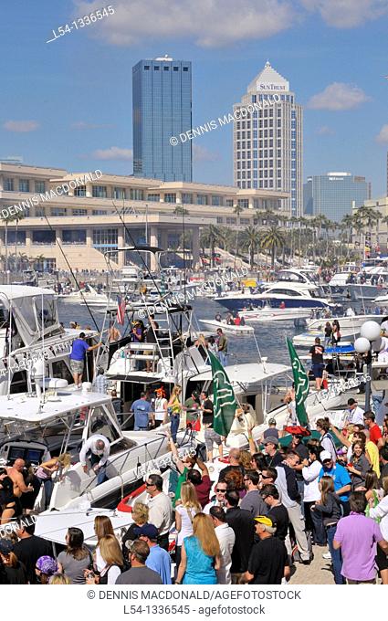 Crowd with boats downtown Tampa Gasparilla Pirate Festival