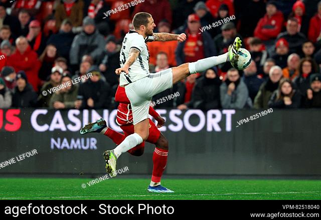 Charleroi's Damien Marcq and Standard's Noah Chidiebere Ohio fight for the ball during a soccer match between Standard de Liege and Sporting Charleroi