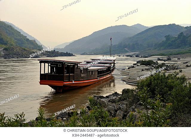 cruise boat, owned by '' The Luang Say Lodge & Cruises'', moored on the bank of Mekong River in front of the Luang Say Lodge at Pakbeng, Oudomxay Province, Laos