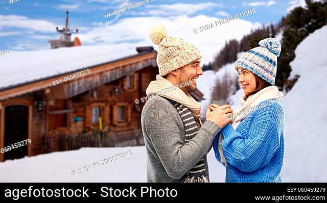 happy couple holding hands in winter