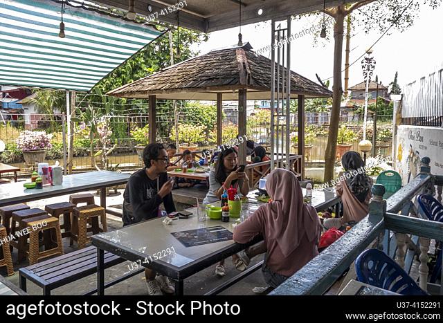 Customers at Rumah Keluarga Tjhia (Tjhia's villa), Singkawang, West Kalimantan, Indonesia are mostly local residents looking for a private villa to host parties...