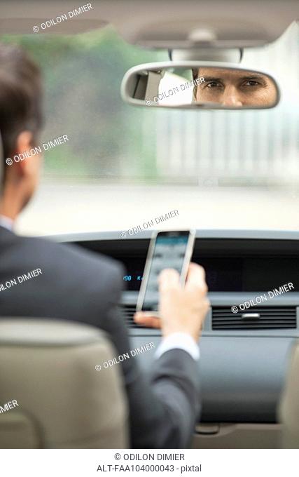 Using cell phone while driving car