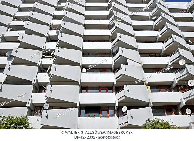 High-rise apartment building with balconies and satellite dishes, satellite town of Chorweiler in Cologne, North Rhine-Westphalia, Germany, Europe