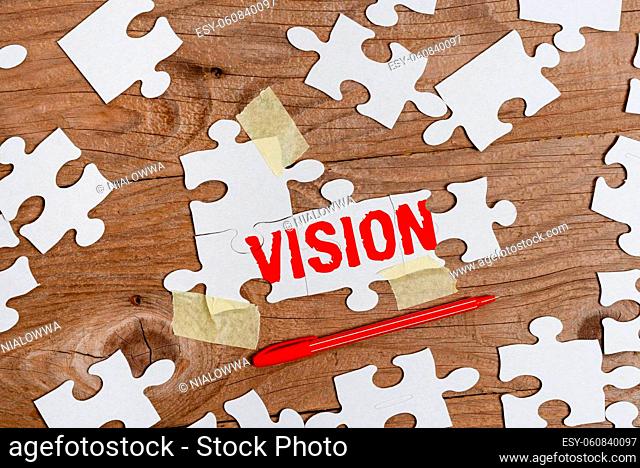 Conceptual caption Vision, Concept meaning ability to think about or plan the future with imagination or wisdom Building An Unfinished White Jigsaw Pattern...