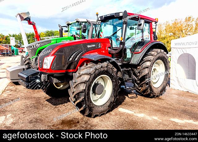 Samara, Russia - September 15, 2019: Modern agricultural wheeled tractor Valtra at the annual Volga agro-industrial exhibition