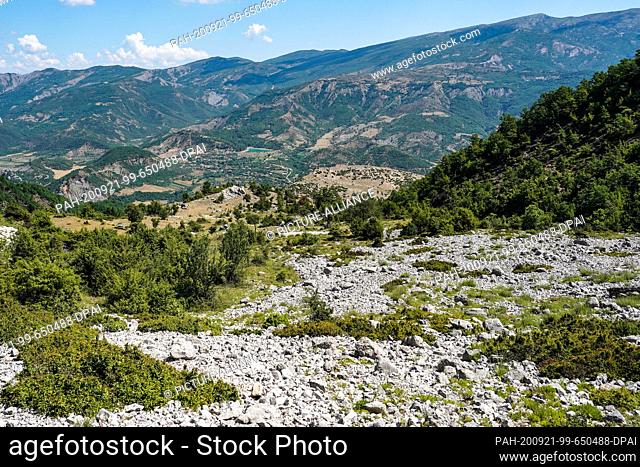 26 June 2020, Albania, Përmet: A mountain range at the valley of the Vjosa near Permet, here with view into the valley. Photo: Peter Endig/dpa-Zentralbild/ZB