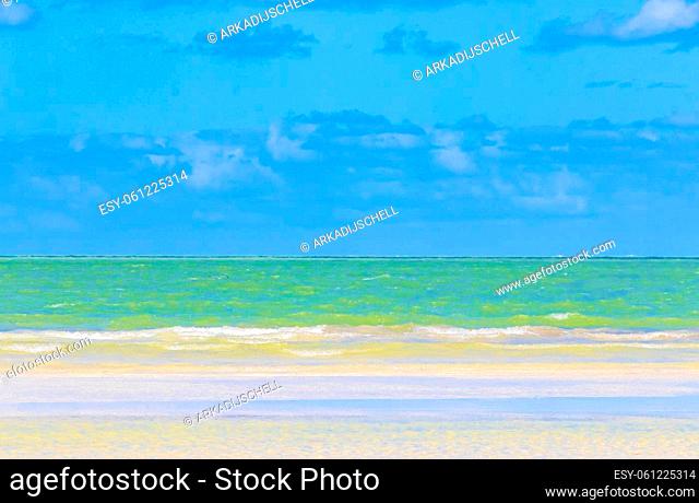 Natural panorama landscape view on beautiful Holbox island sandbank and beach with waves turquoise water and blue sky in Quintana Roo Mexico