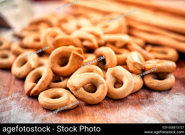 Assortment of bakery products on a wooden table. High quality photo