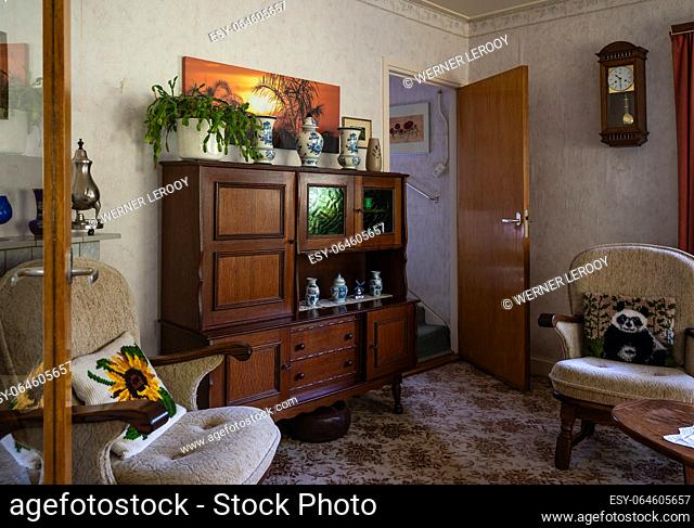 Ingen, Gelderland, the Netherlands, July 12, 2023 - Old fashioned interior design of a retro living room