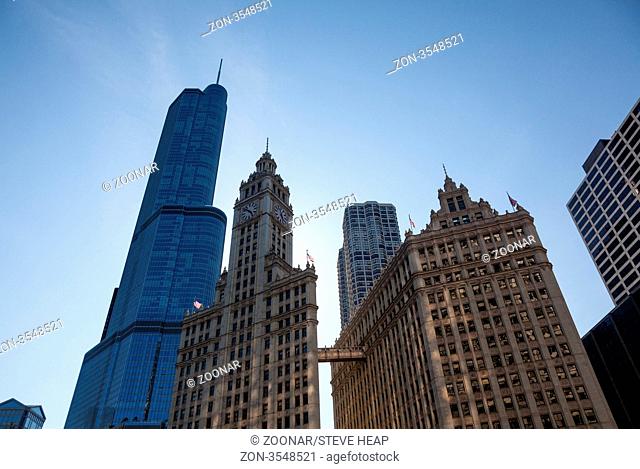 CHICAGO - MAY 14: Trump Tower looms behind Wrigley Building in Chicago on May 14, 2012. Trump Tower tops out at 1389 feet