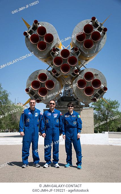 In front of a mockup of a Soyuz rocket in the town of Baikonur, Kazakhstan, Expedition 4041 backup crew members Terry Virts of NASA (left)