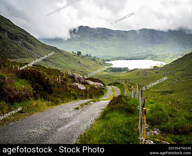 Gravel road to a lough in county kerry ireland
