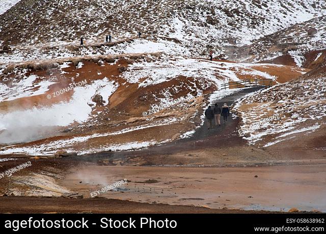 Gunnuhver, Iceland - March 29 2016: People walking at the Gunnuhver Geothermal field at Reykjanes Peninsula in the island of Iceland