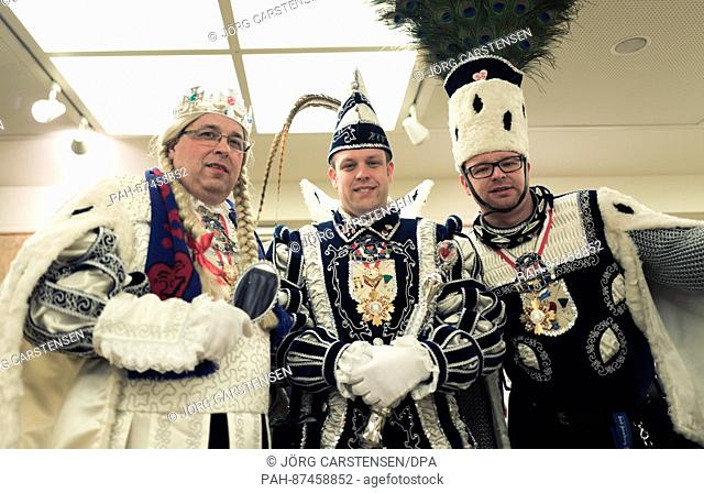 Virgin Sandra I. (l-r, Allessandro Cinelli), Prinz Karneval Florian I. (Florian Theiss) and Farmer (Christian Knauerhase) from the Homburger Carneval club...