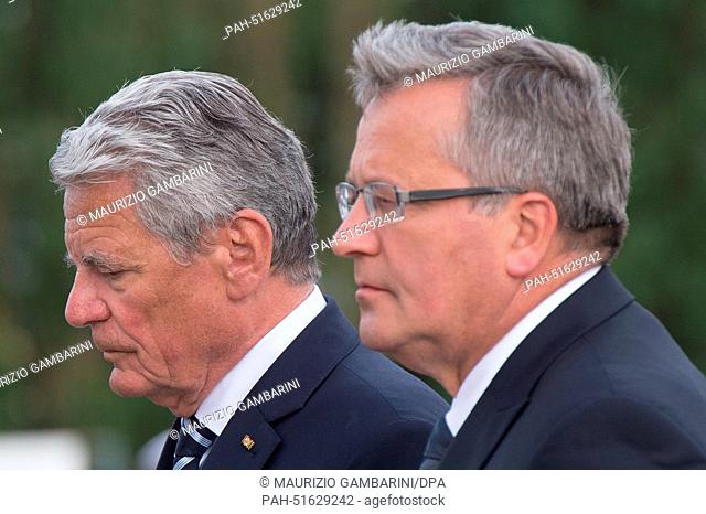 German President Joachim Gauck (L) and Polish President Bronisaw Komorowski lay wreaths at the memorial for the defenders of the Westerplatte during a...