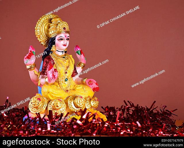 Lakshmi - Hindu goddess , Goddess Lakshmi. Goddess Lakshmi during Diwali Celebration. Indian Hindu Light Festival called Diwali