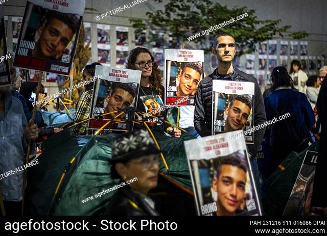 16 December 2023, Israel, Tel Aviv: Israelis and family member of the hostage families protest outside Kiriya military base calling on Prime Minister Benjamin...