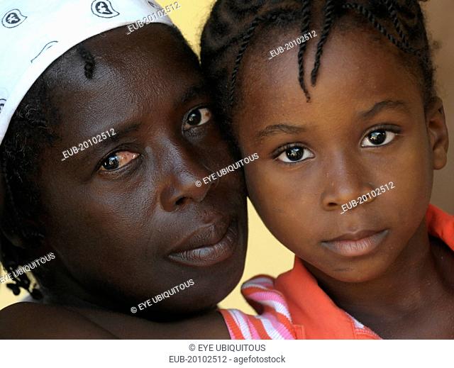 Head and shoulders portrait of a mother and daughter