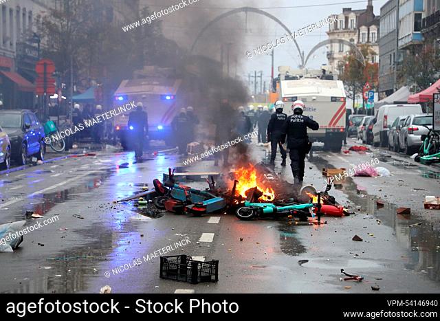 Illustration picture shows fire from a pile of rental e-steps lying in the middle of the street, in the center of Brussels