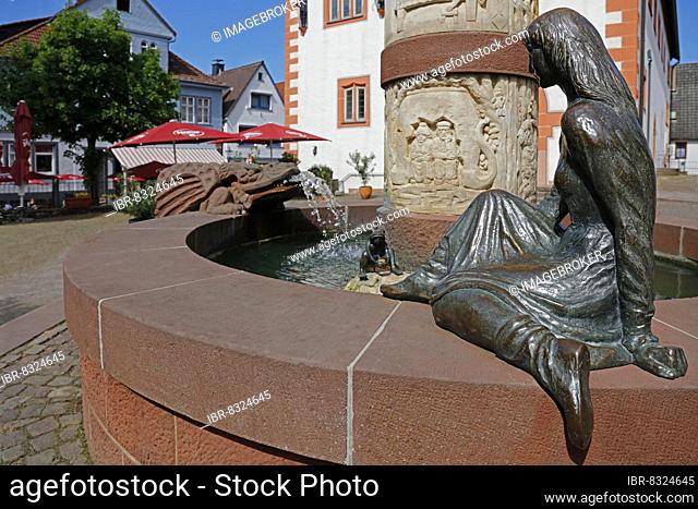 Fairytale fountain, princess, frog, water spouting dragon, column, reliefs, fisherman and his fruition, town hall, Steinau an der Straße, Main-Kinzig-Kreis