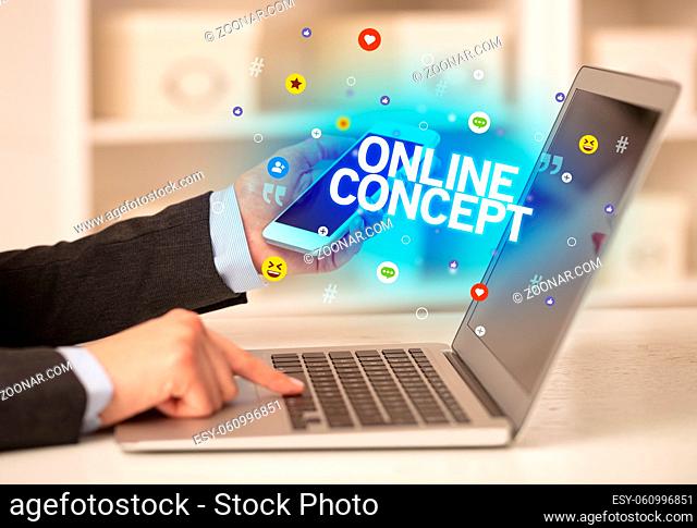 Freelance woman using laptop with ONLINE CONCEPT inscription, Social media concept