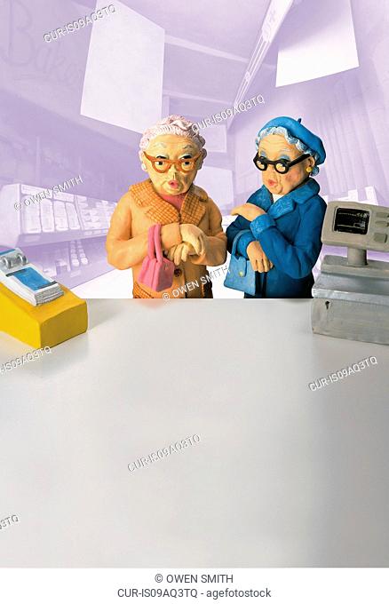 Model of two senior women standing in front of pharmacy counter