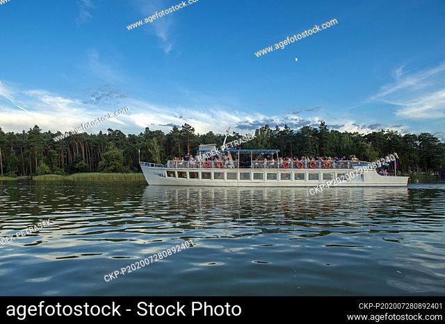 Evening cruise of the boat May (Maj) on Lake Macha (Machovo jezero) is seen on July 28, 2020, in Doksy, Czech Republic. (CTK Photo/Radek Petrasek)
